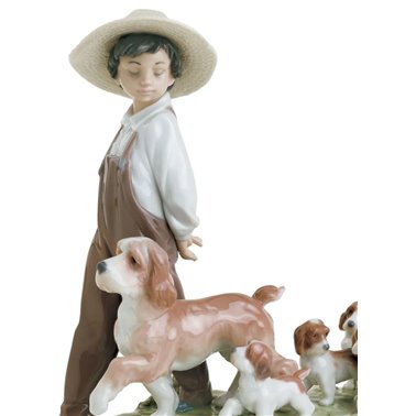 Figurine garçon avec chiens...